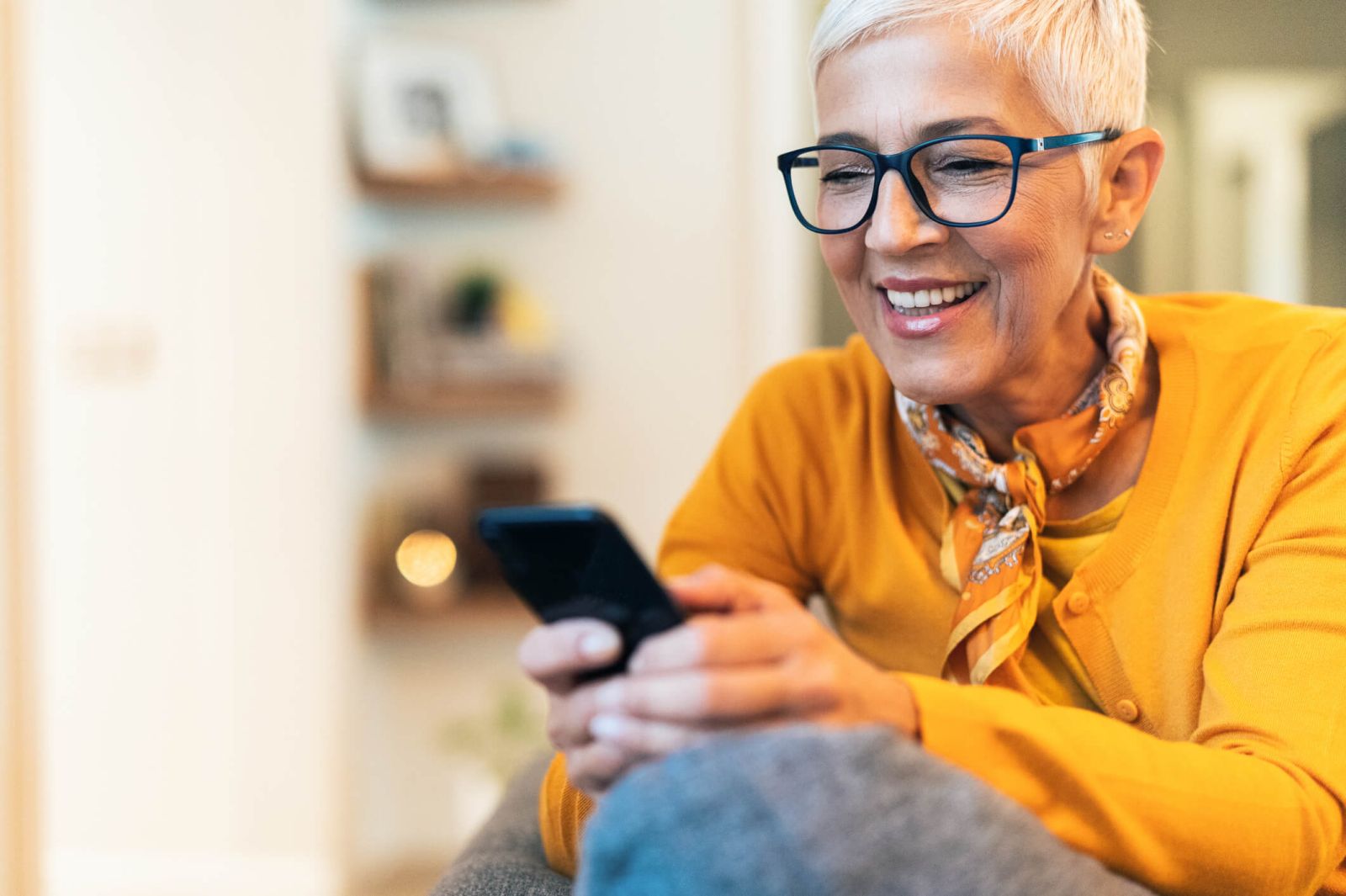 mature woman using her mobile phone